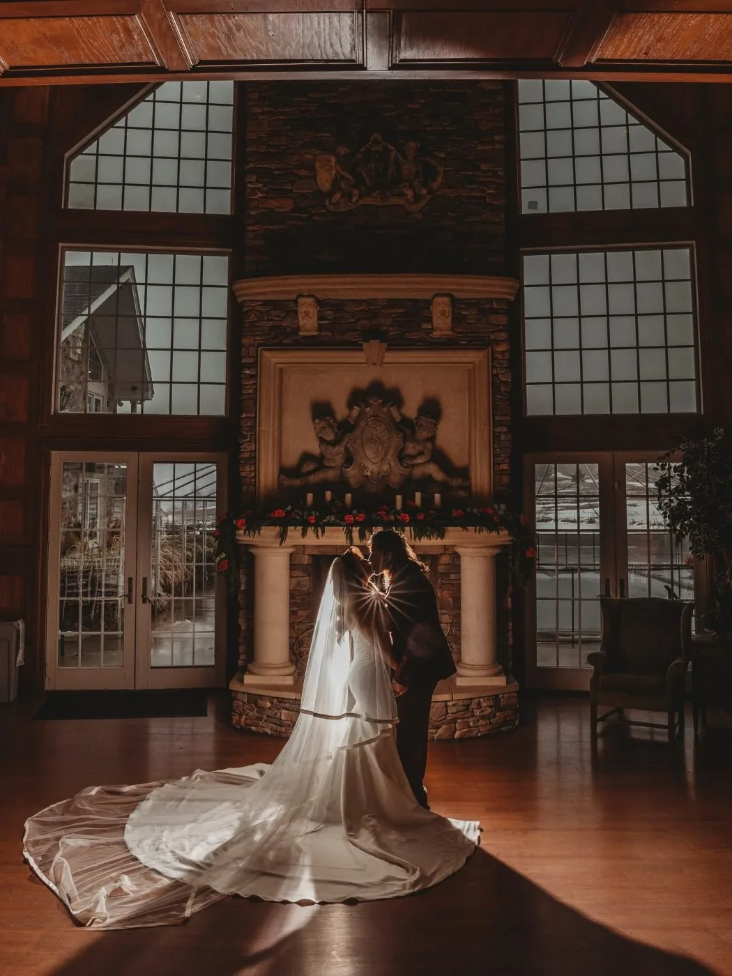 A couple in the wood-paneled Grand Lobby