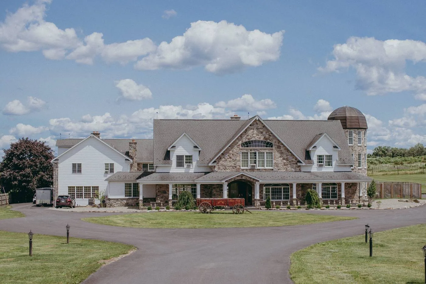 The stone mansion and its turret on a clear day